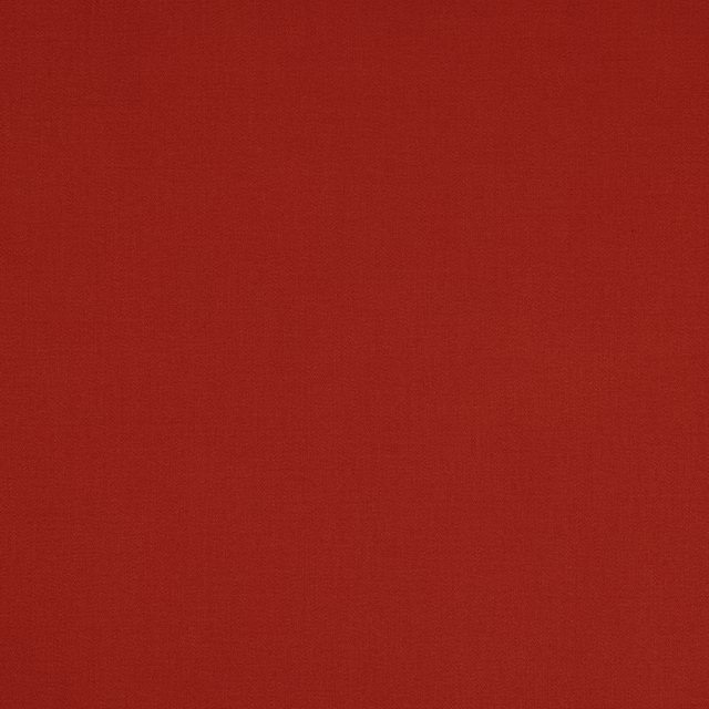 Deep burnt red cotton swatch with a fine, even woven texture