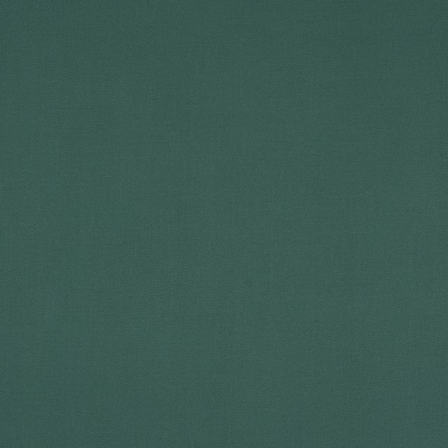 Muted eucalyptus green plain-woven cotton fabric swatch with fine texture