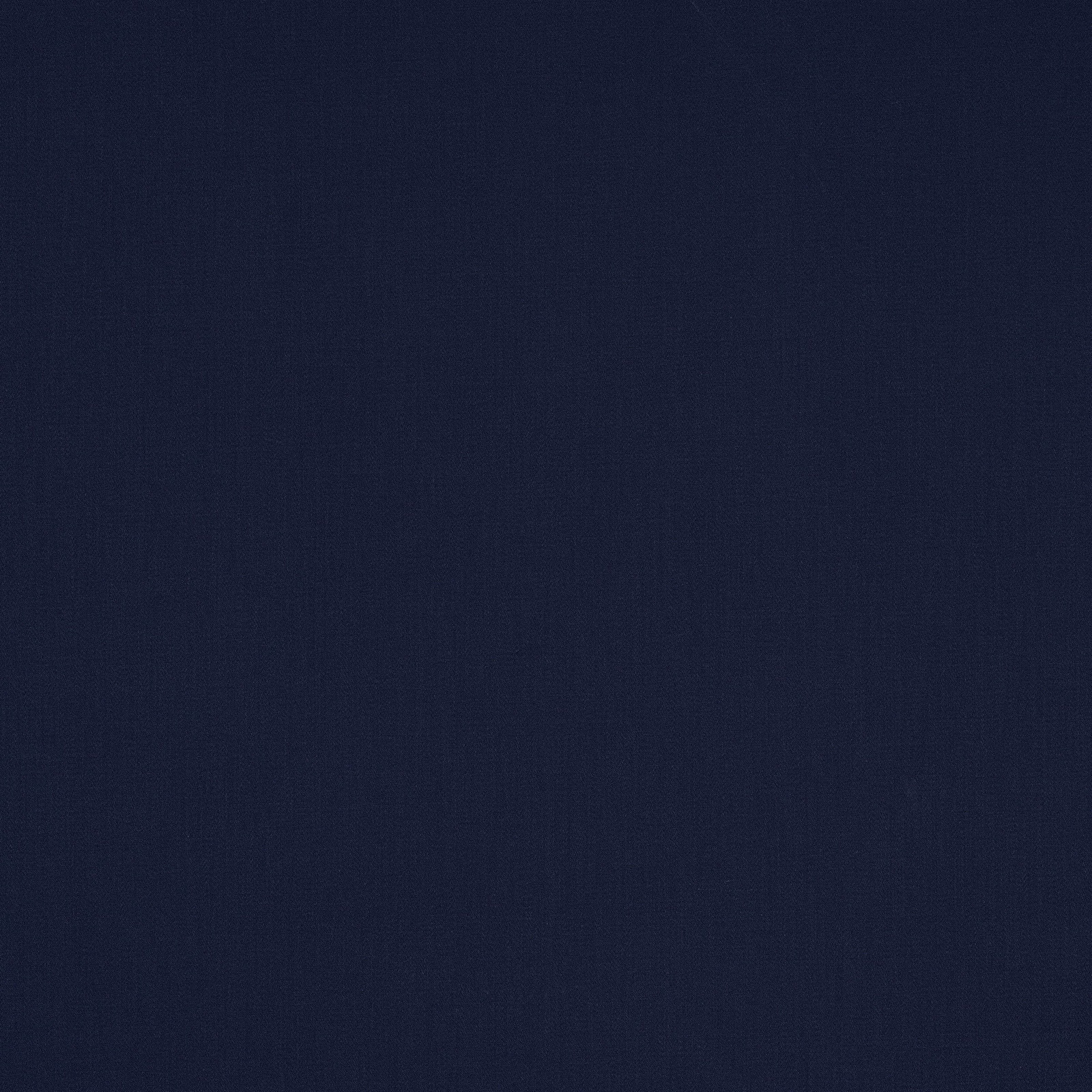 Solid deep indigo blue cotton fabric swatch with a fine woven texture