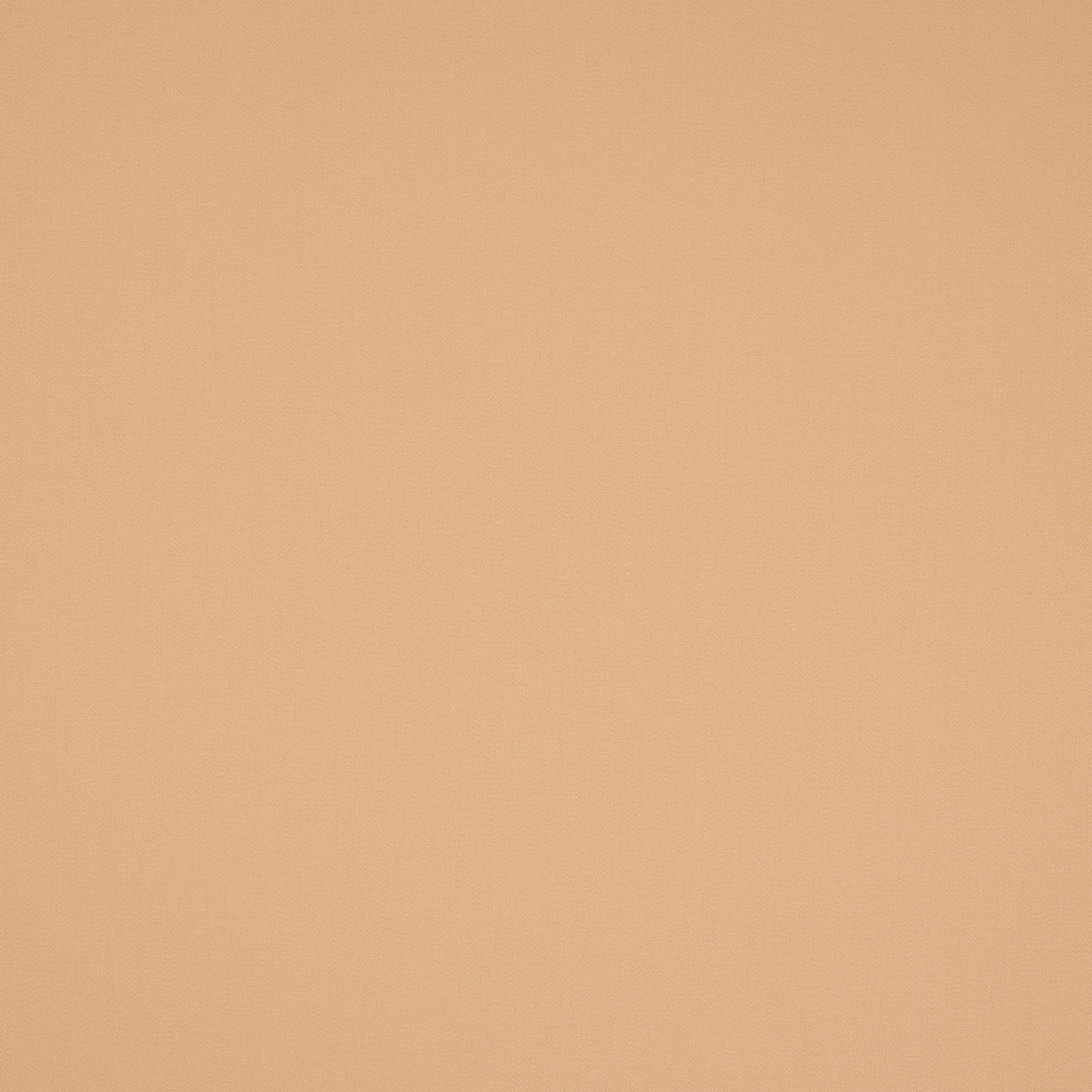 Plain muscade peach cotton fabric with a smooth, matte finish