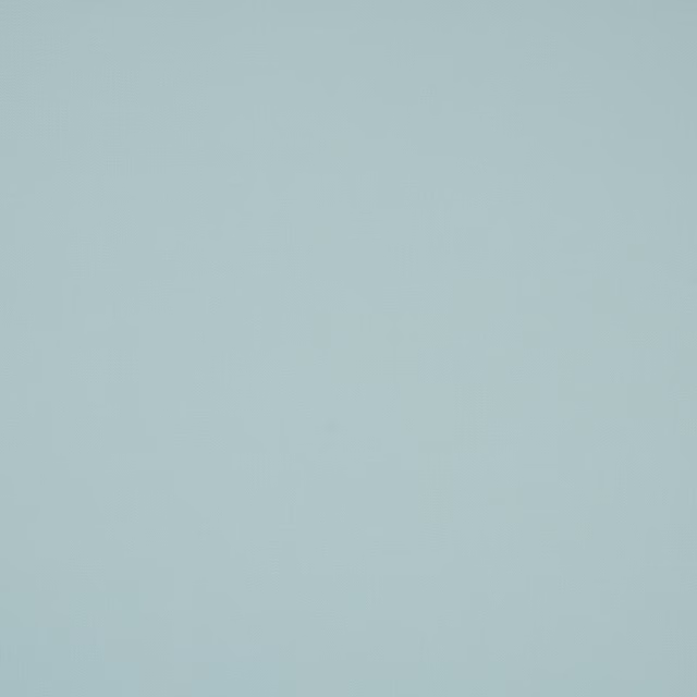 Plain pale powder blue cotton fabric swatch with a soft matte finish