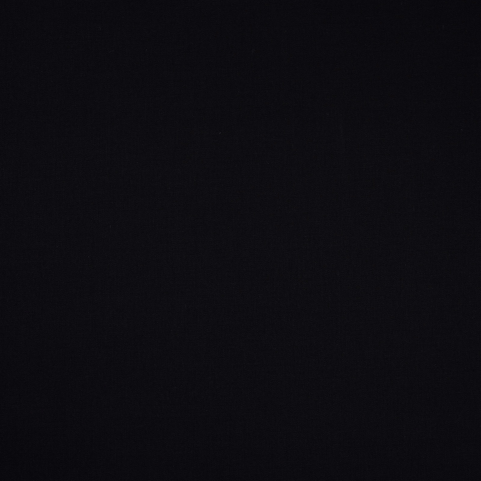 Dark matte black plain cotton swatch with subtle woven texture