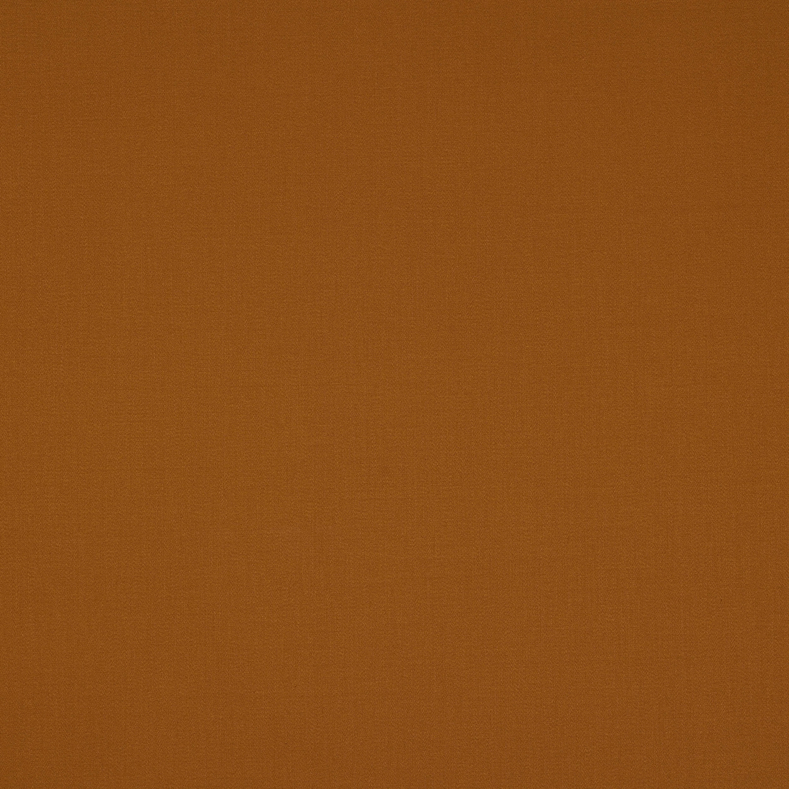 Plain burnished ochre cotton fabric with a fine, even weave