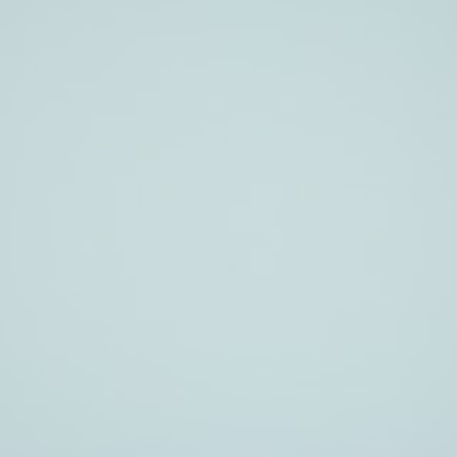 Pale opaline blue plain cotton fabric with a soft matte finish