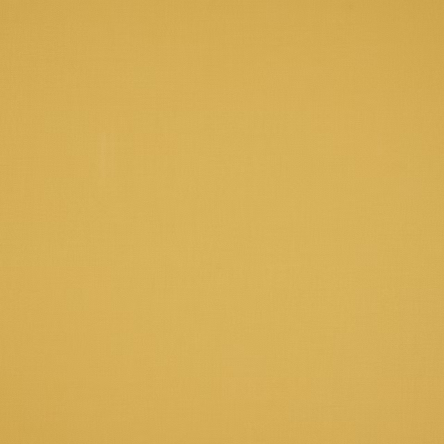 Solid mustard-gold cotton fabric swatch with a fine plain weave