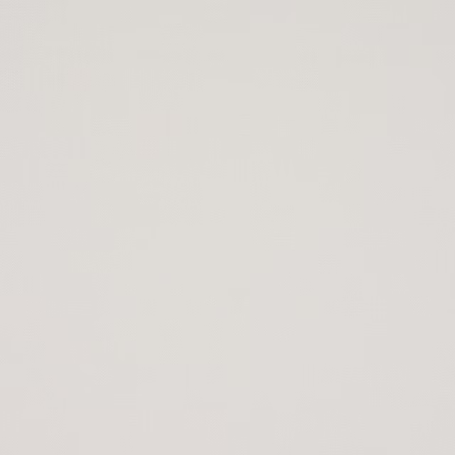 Pale ivory plain-woven cotton fabric swatch with a soft matte finish