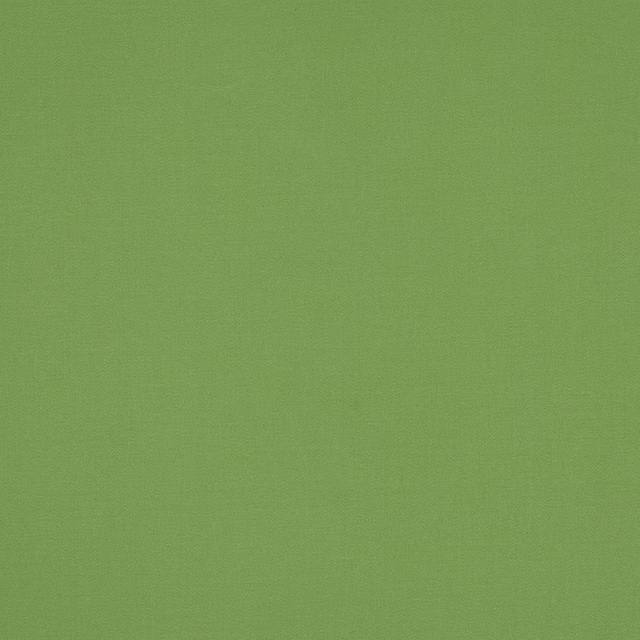 Plain pistache green cotton fabric swatch with a smooth matte weave