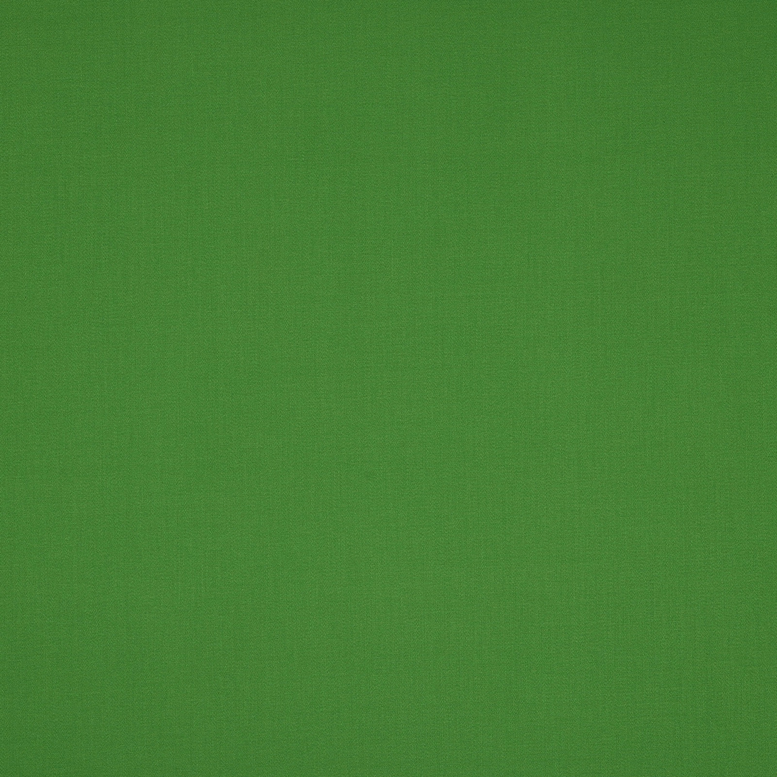 Fresh grass-green plain cotton fabric with a subtle woven texture