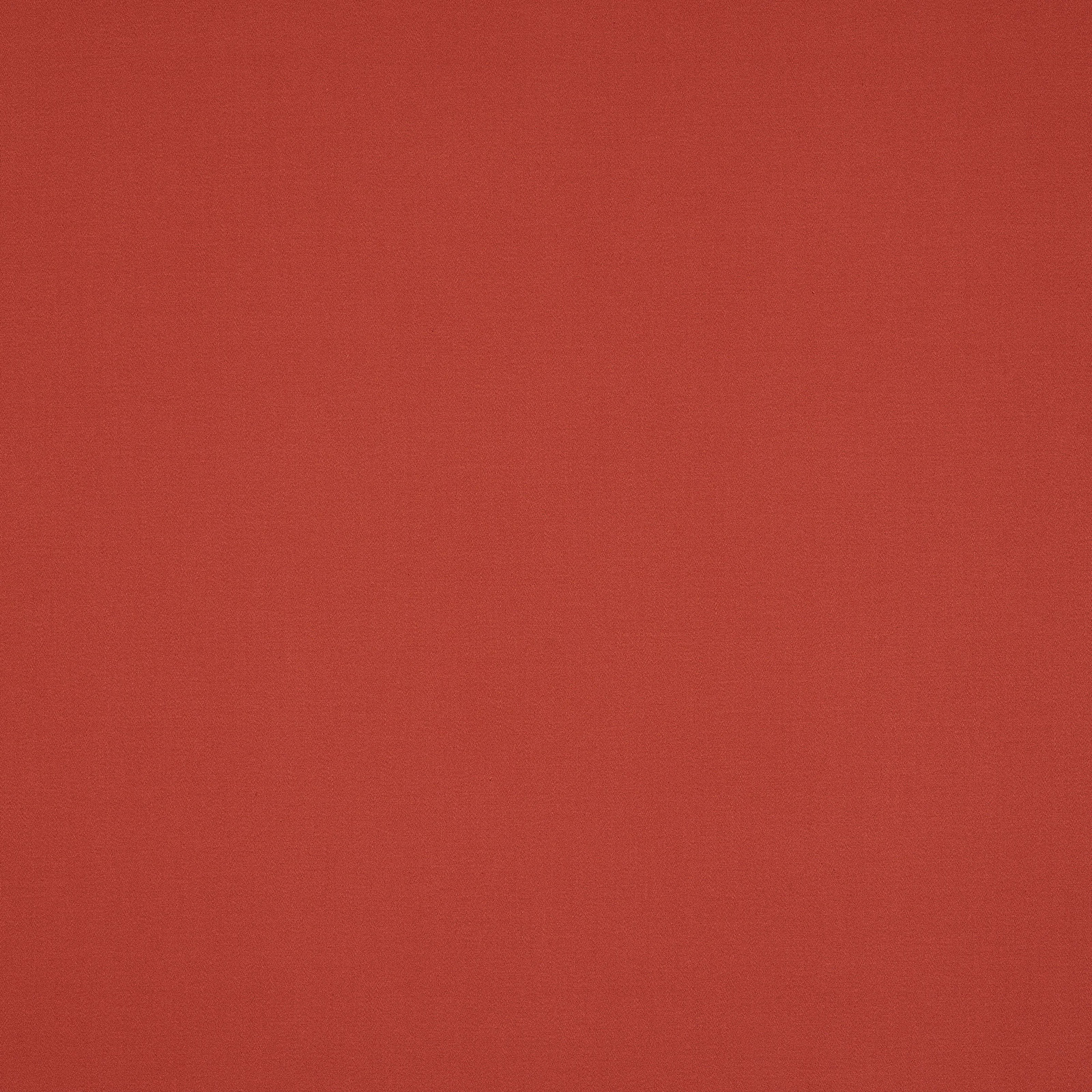 Plain warm terracotta cotton fabric with a smooth matte weave