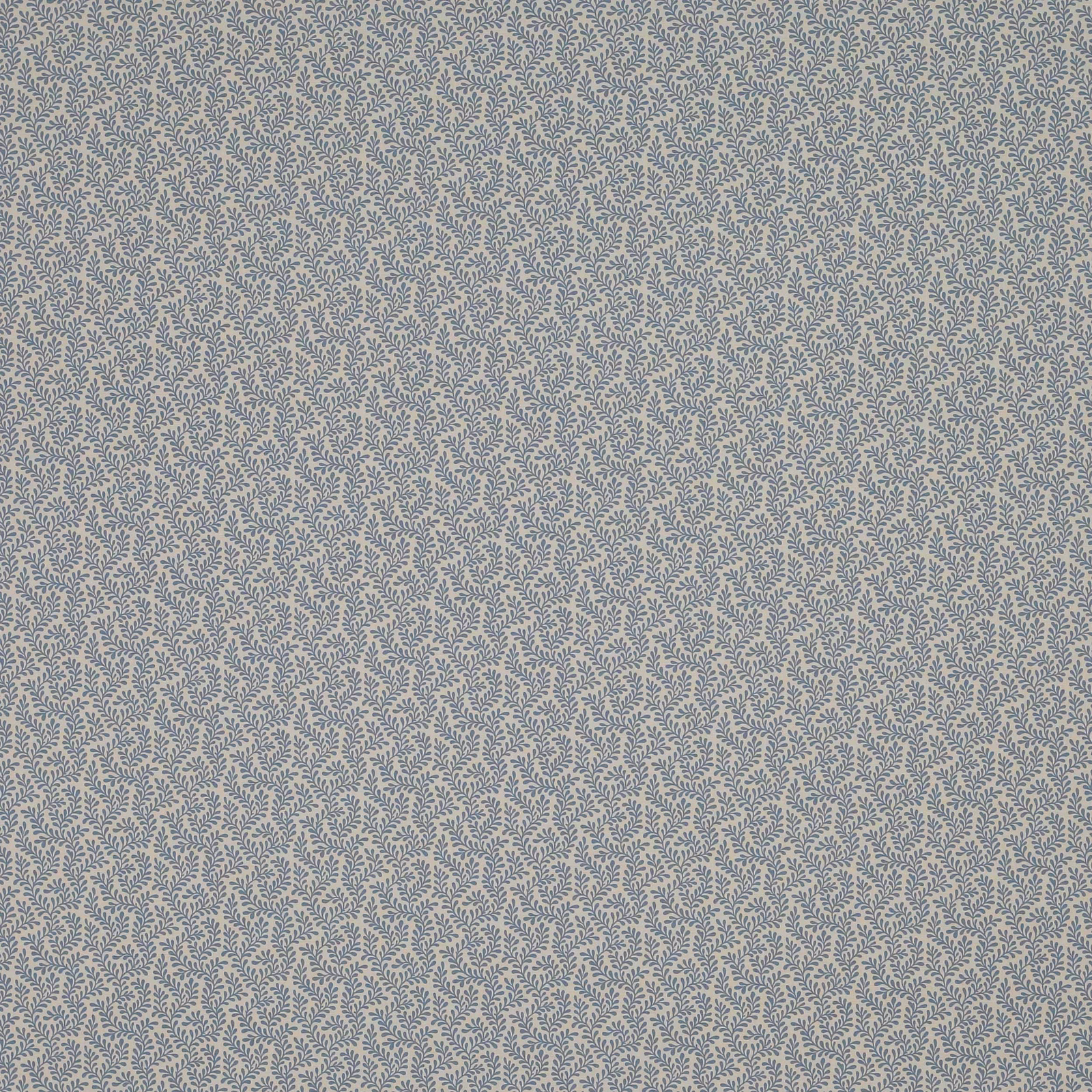 Close-up of a small leaf motif fabric in soft dusty blue on a pale ground