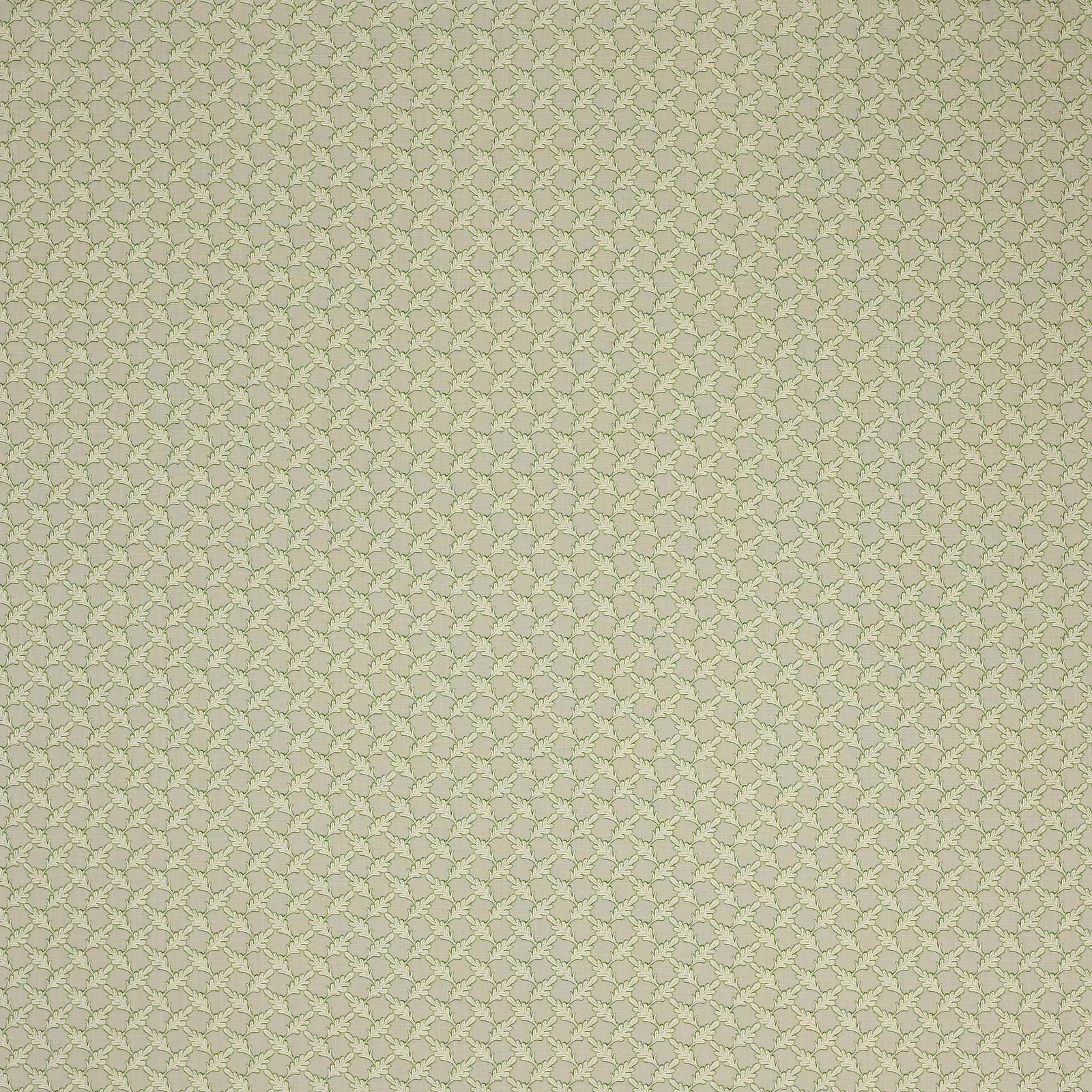 Close-up of Oaken Beige linen fabric with a small leaf motif in warm beige tones