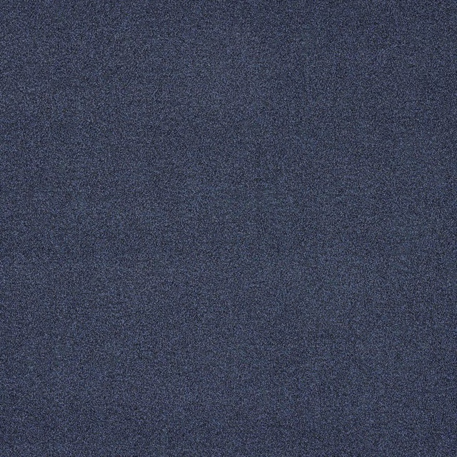 Close-up of a deep marine blue plain weave fabric with fine mottled texture