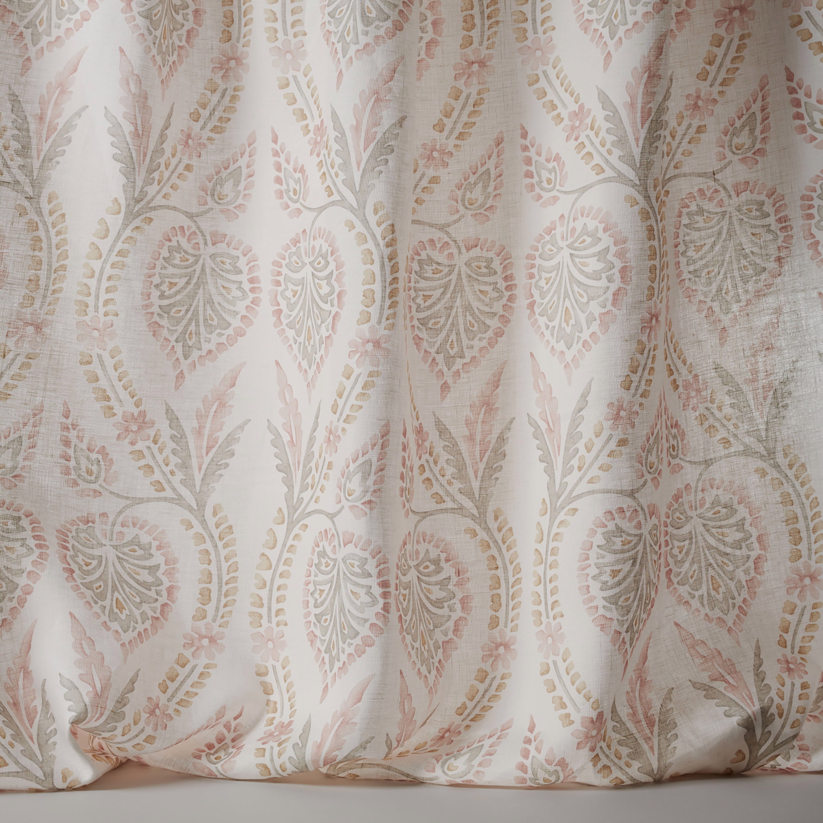 Blush pink and stone leaf motif on a pale linen sheer fabric