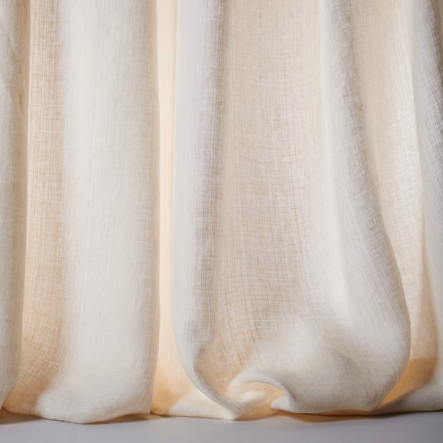 Soft cream linen sheer curtains with fine open weave and gentle folds