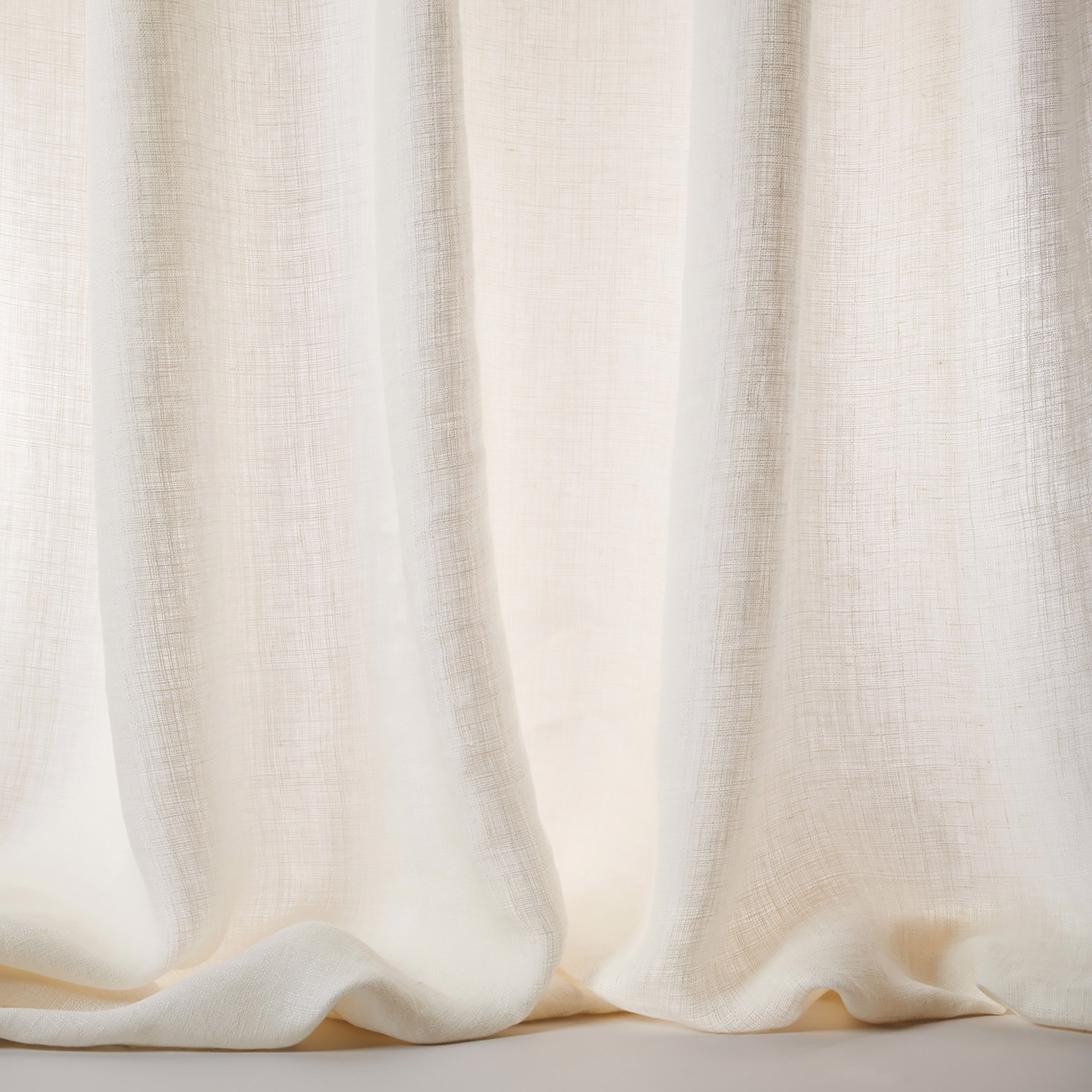 Soft ivory linen sheer with a fine natural weave and flowing folds