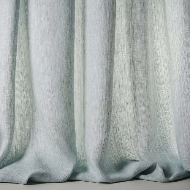 Soft pale blue linen sheer fabric with a subtle slubby weave and hanging folds