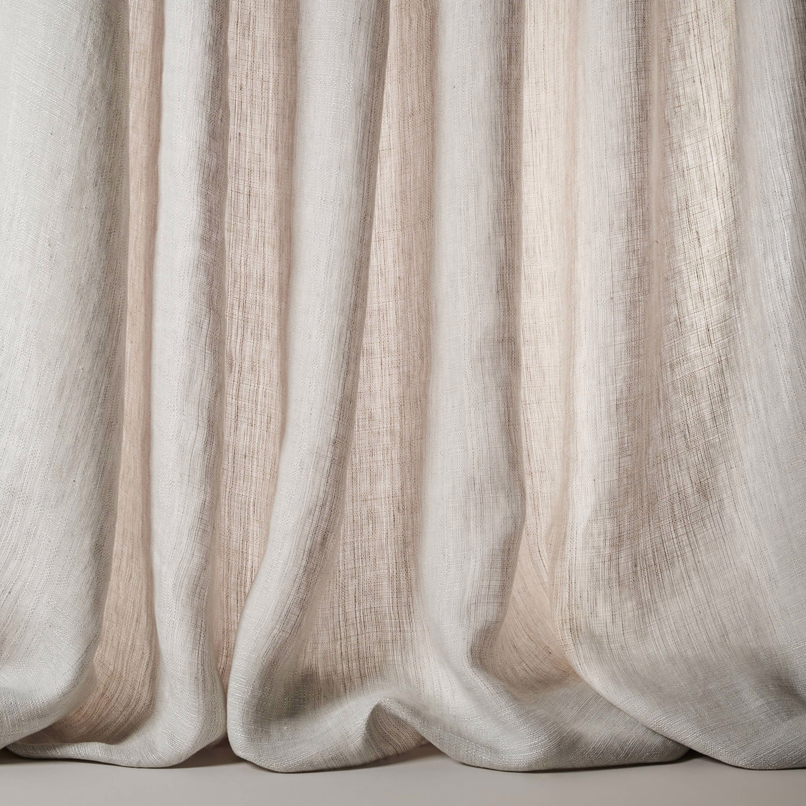Soft silver-beige linen sheer with fine slub texture and flowing drape