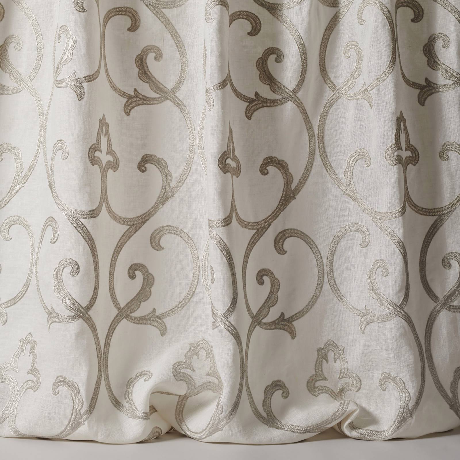 Pale silver-grey damask sheer fabric with scrolling motif and soft linen texture