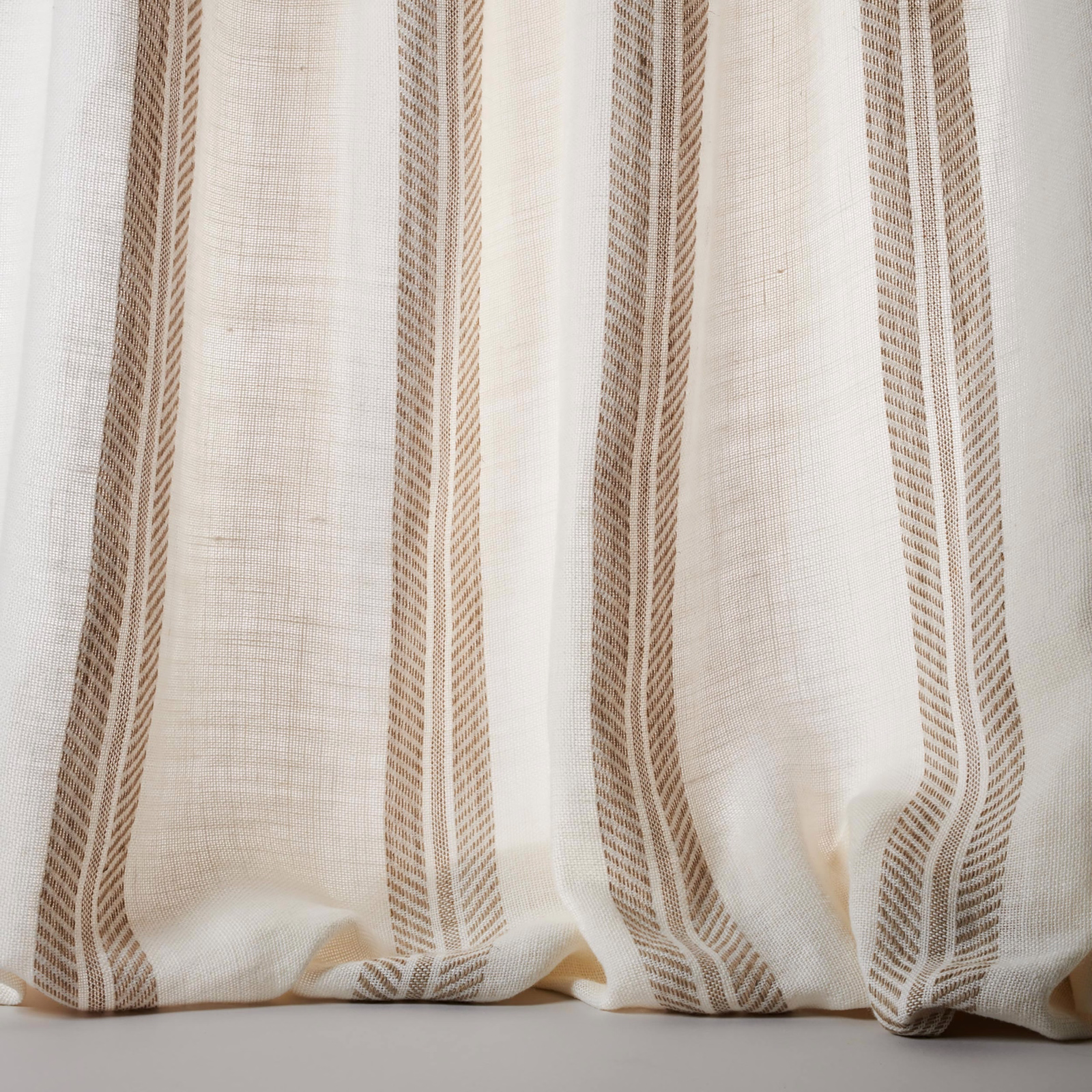 Cream linen sheer with vertical beige stripes and soft woven texture