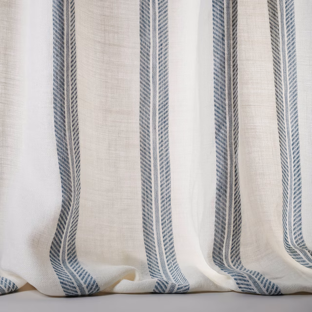 Ivory linen sheer with narrow blue-grey vertical stripes and soft drape