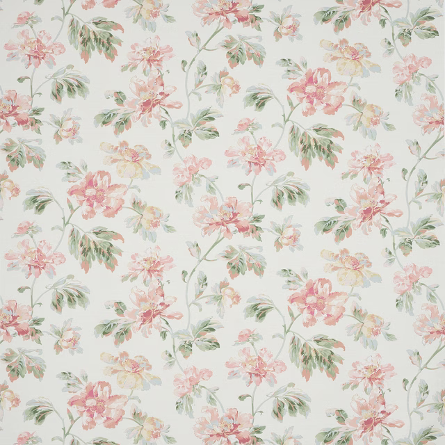 Painterly pink and apricot floral fabric with soft green leaves on ivory