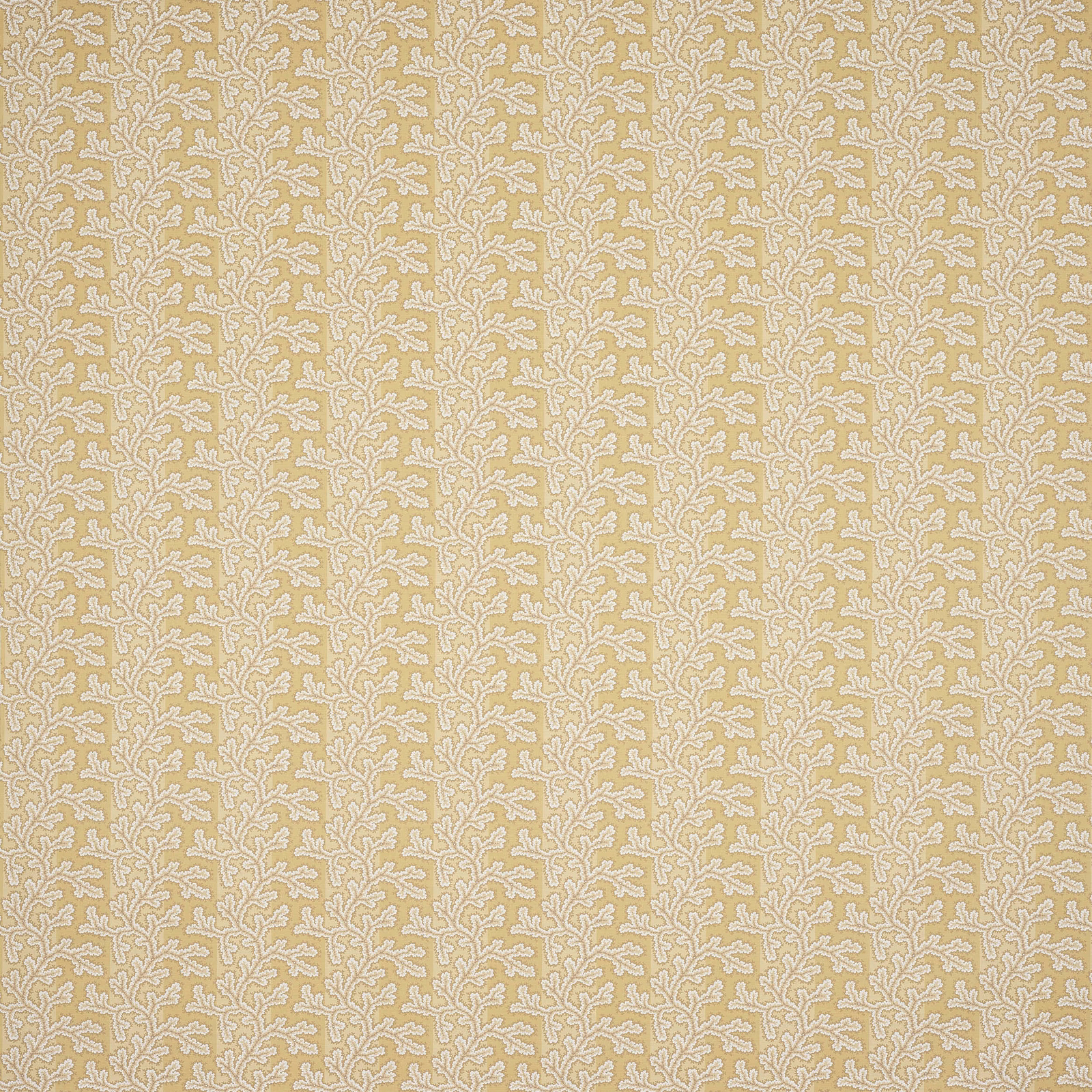 Small cream damask pattern on a soft antique gold woven fabric swatch
