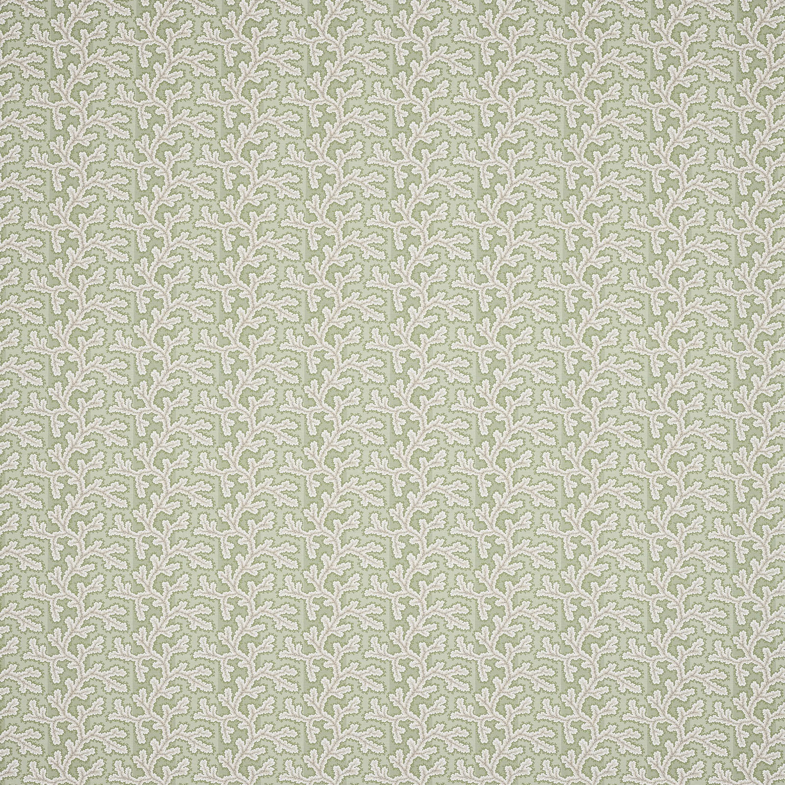 Soft sage green small damask fabric with pale outline and woven texture
