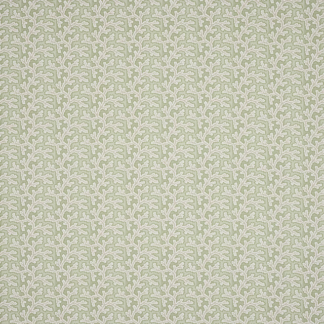 Soft sage green small damask fabric with pale outline and woven texture