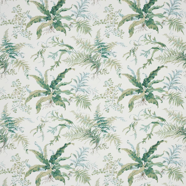 Painterly green botanical fabric with leafy sprays on a pale ground