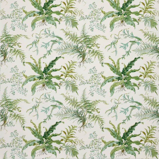 Botanical fabric with leafy green sprays on a pale ground