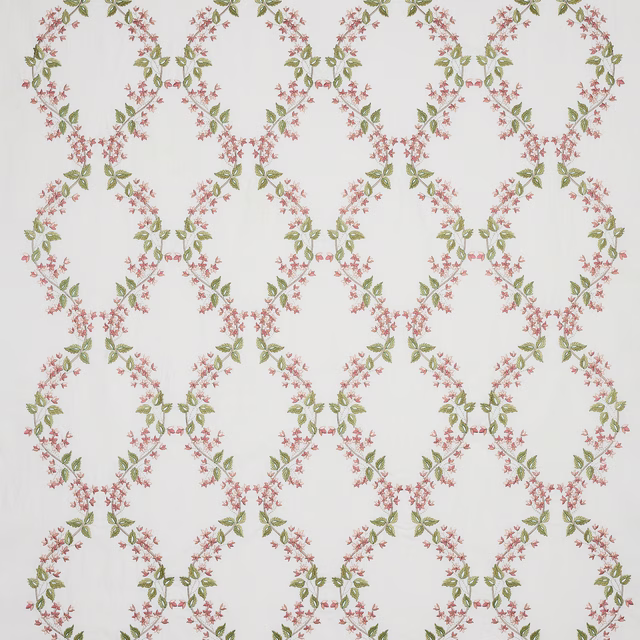 Pink and green floral lattice print on a pale ivory ground