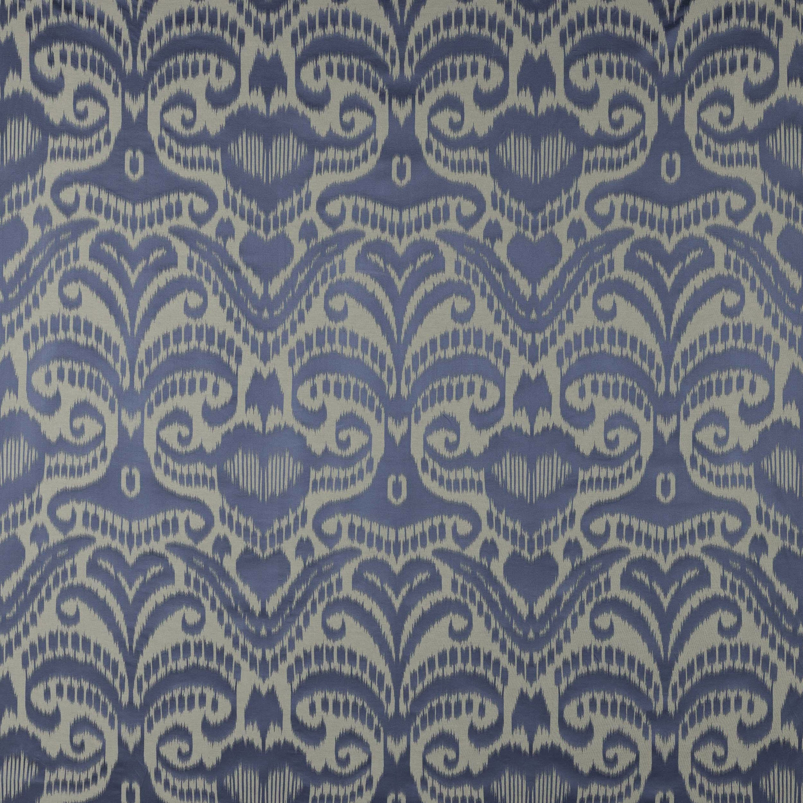 Blue and ivory woven damask fabric with scrolling large-scale motif
