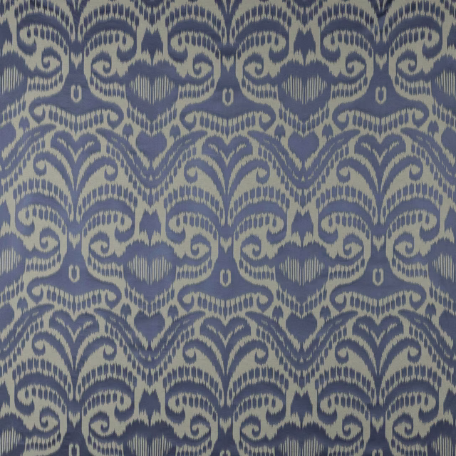 Blue and ivory woven damask fabric with scrolling large-scale motif