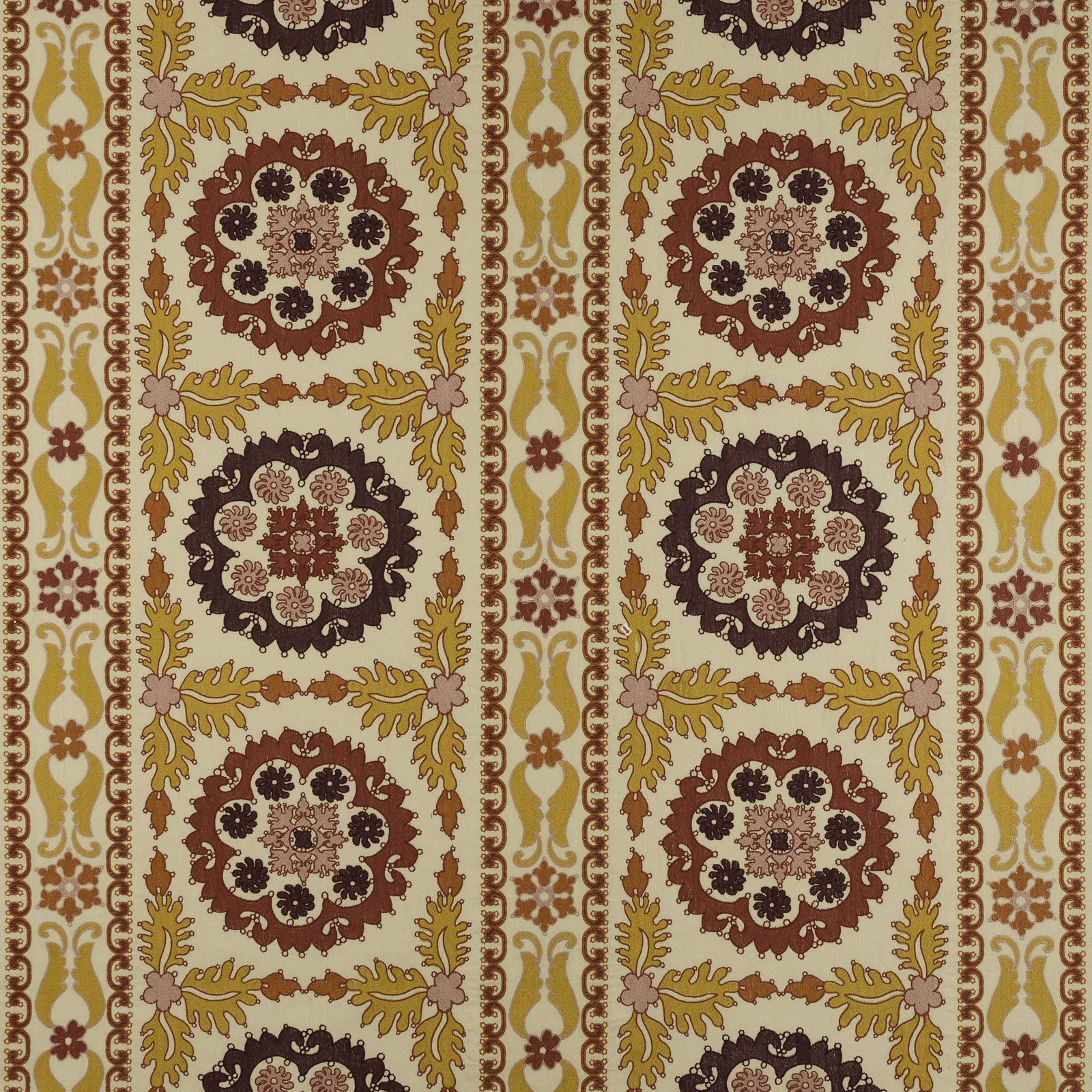Decorative damask fabric swatch in saffron, orange, rose and plum on a cream ground