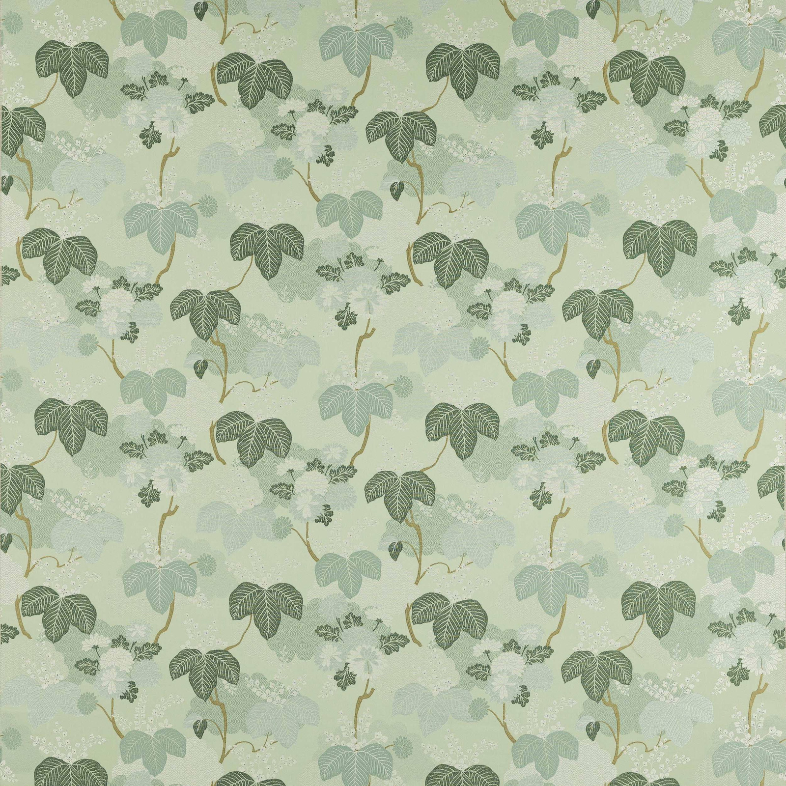 Soft opaline green botanical fabric with layered leaf motifs and ochre stems