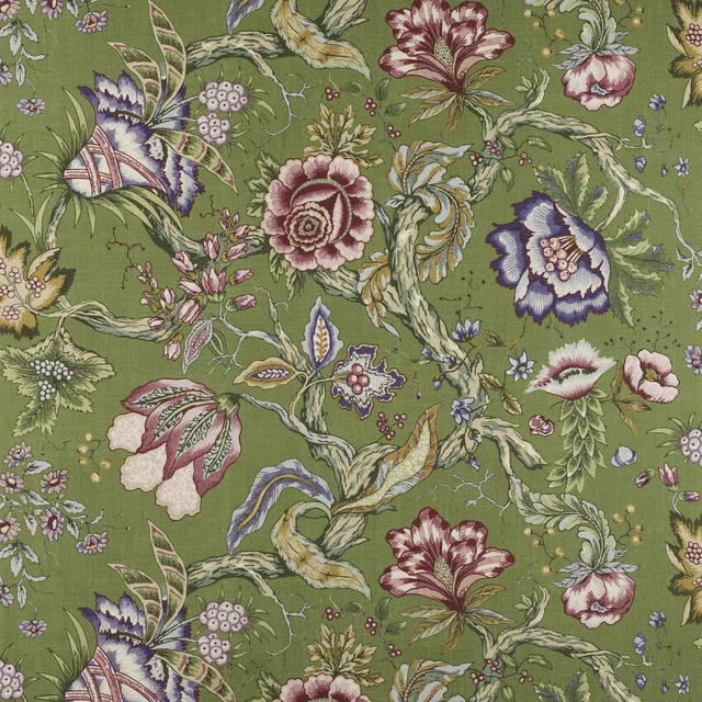 Close-up of floral linen fabric with moss-green ground and pink, blue, and cream blooms