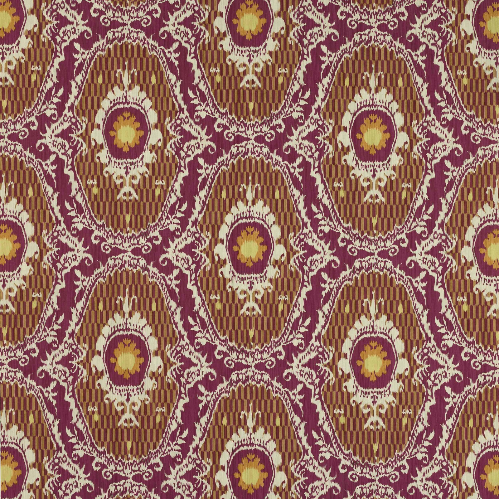 Close-up of Persane Fuchsia damask fabric with fuchsia scrolls, orange medallions and striped rust ground