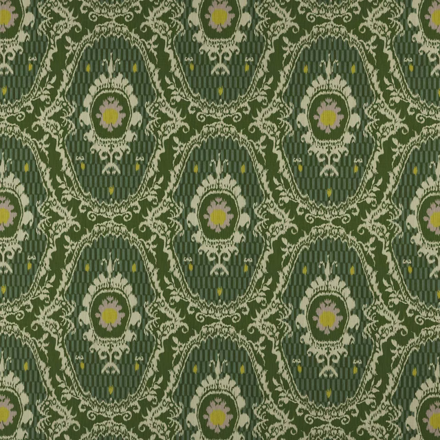 Green geometric cotton fabric with cream scroll lattice and small yellow-flower medallions