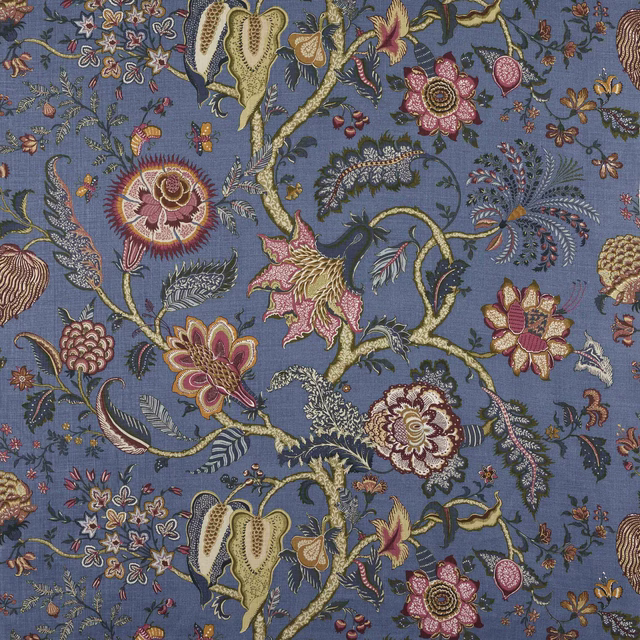 Blue linen fabric with winding floral branches and pink, gold and cream blossoms