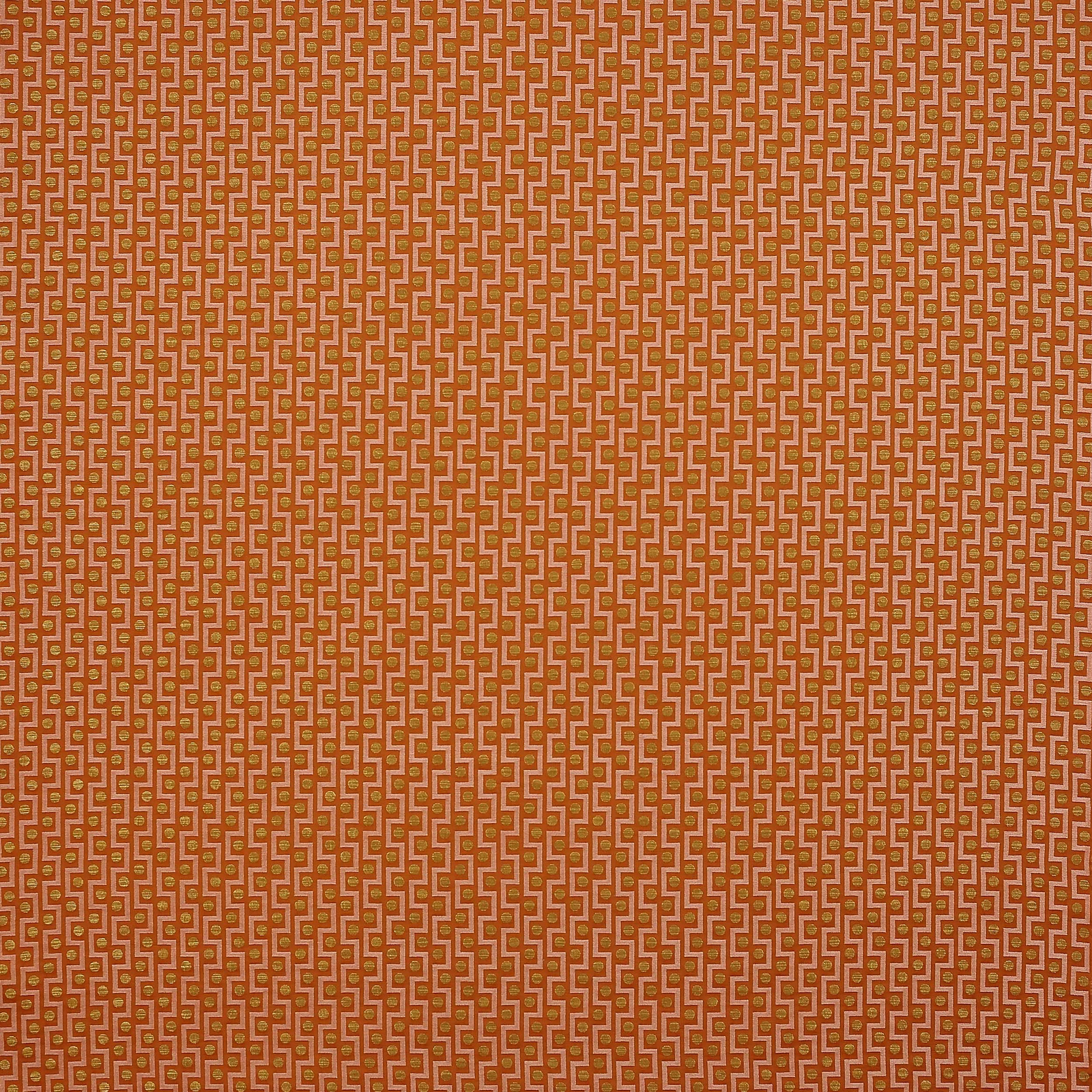 Coral orange geometric woven fabric with small repeating motif