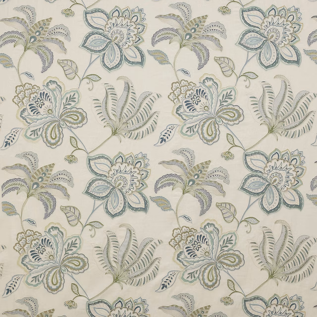 Large stylised floral print in soft blue, sage and ivory on a pale ground