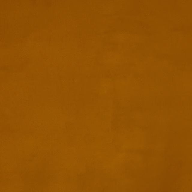 Solid warm amber ochre fabric swatch with a smooth matte cotton surface