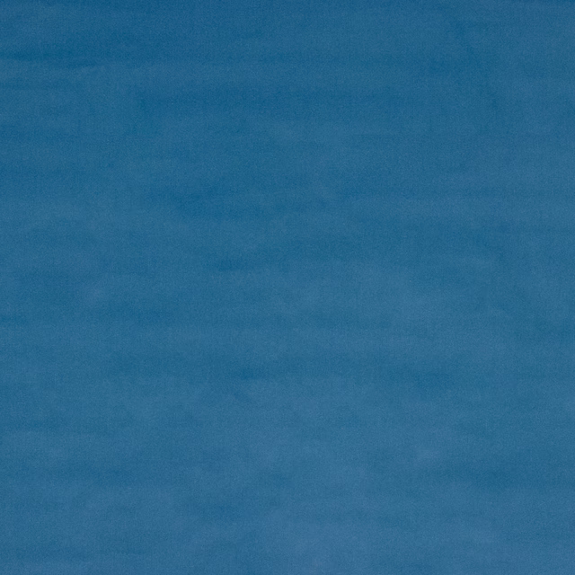 Solid muted teal-blue cotton swatch with a softly brushed surface
