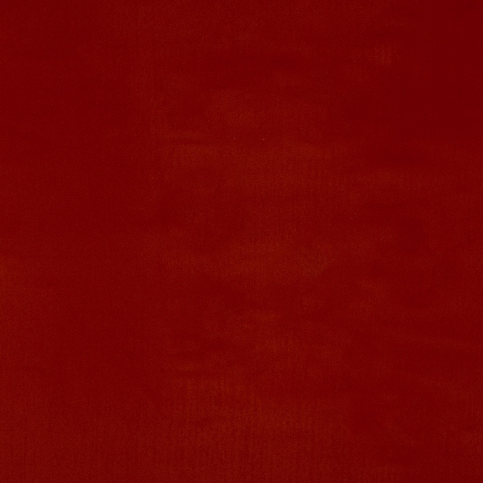 Deep coral-red plain cotton swatch with a softly textured, brushed-looking surface