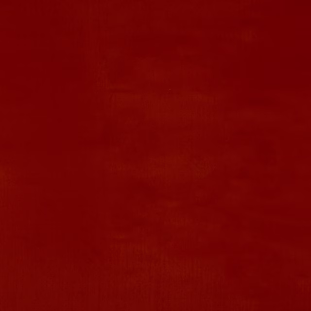 Deep coral-red plain cotton swatch with a softly textured, brushed-looking surface