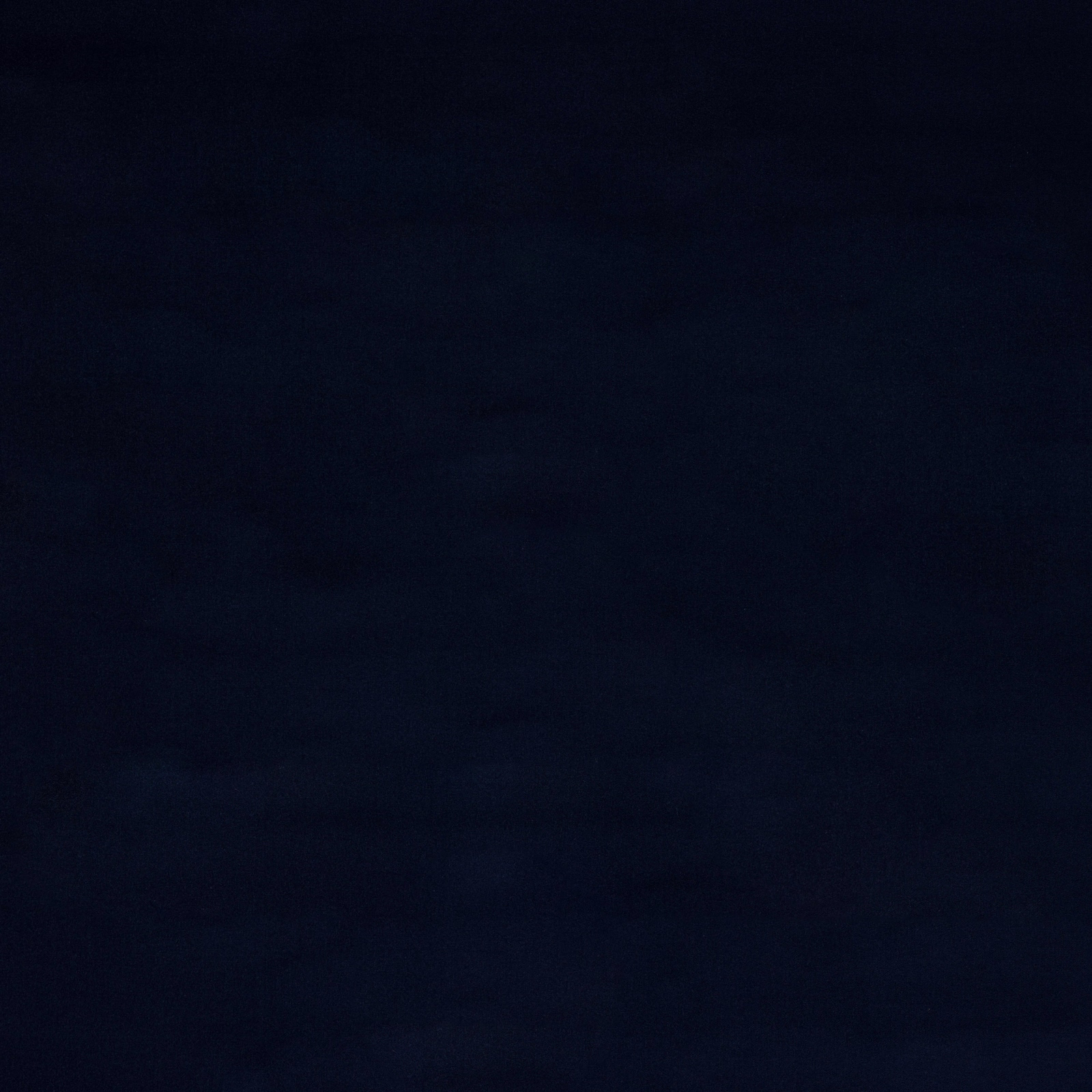 Solid deep navy-blue cotton swatch with a smooth matte surface
