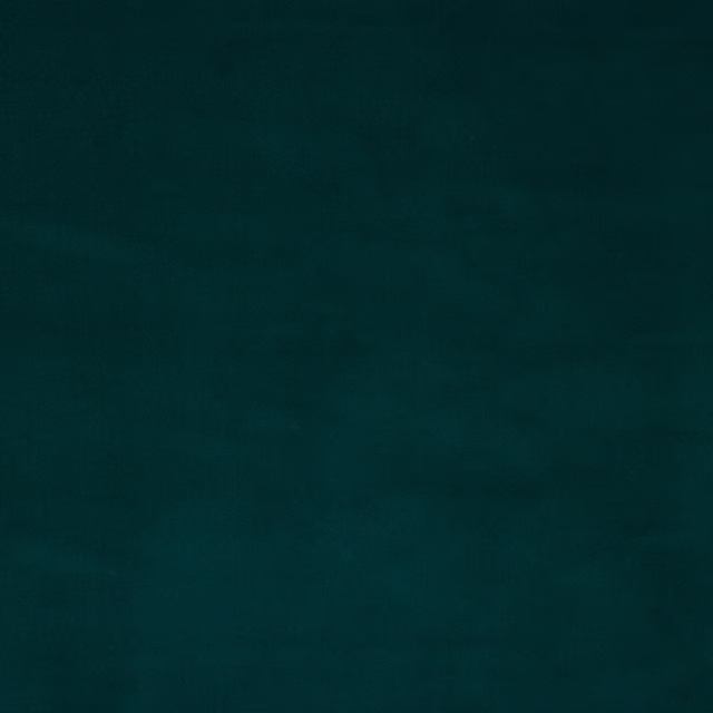 Deep ocean teal plain cotton fabric with a smooth matte surface