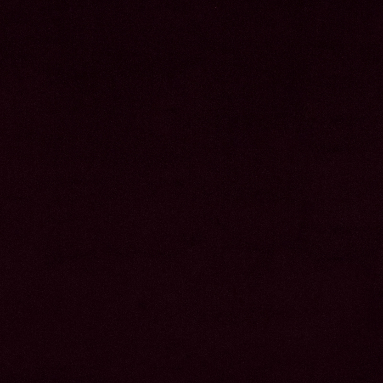 Deep prune burgundy cotton swatch with a smooth, near-solid finish