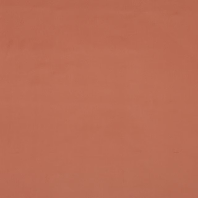 Plain dusty rose pink cotton swatch with a soft matte surface