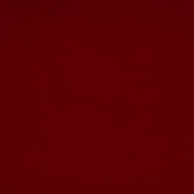 Deep burnt terracotta plain woven cotton fabric swatch